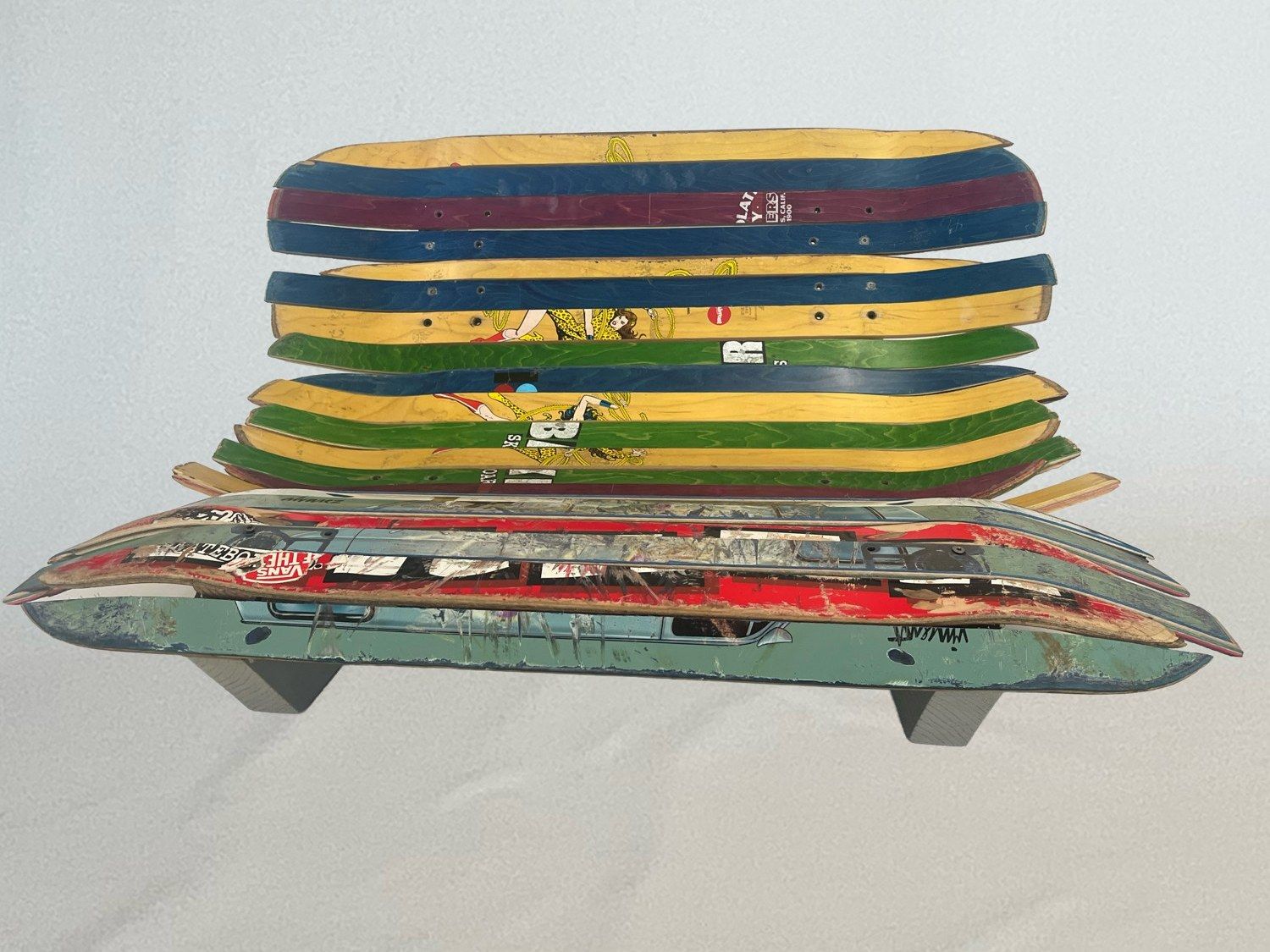 Skateboard Chair: a chair made from Kyle’s own worn skateboards, cut into strips