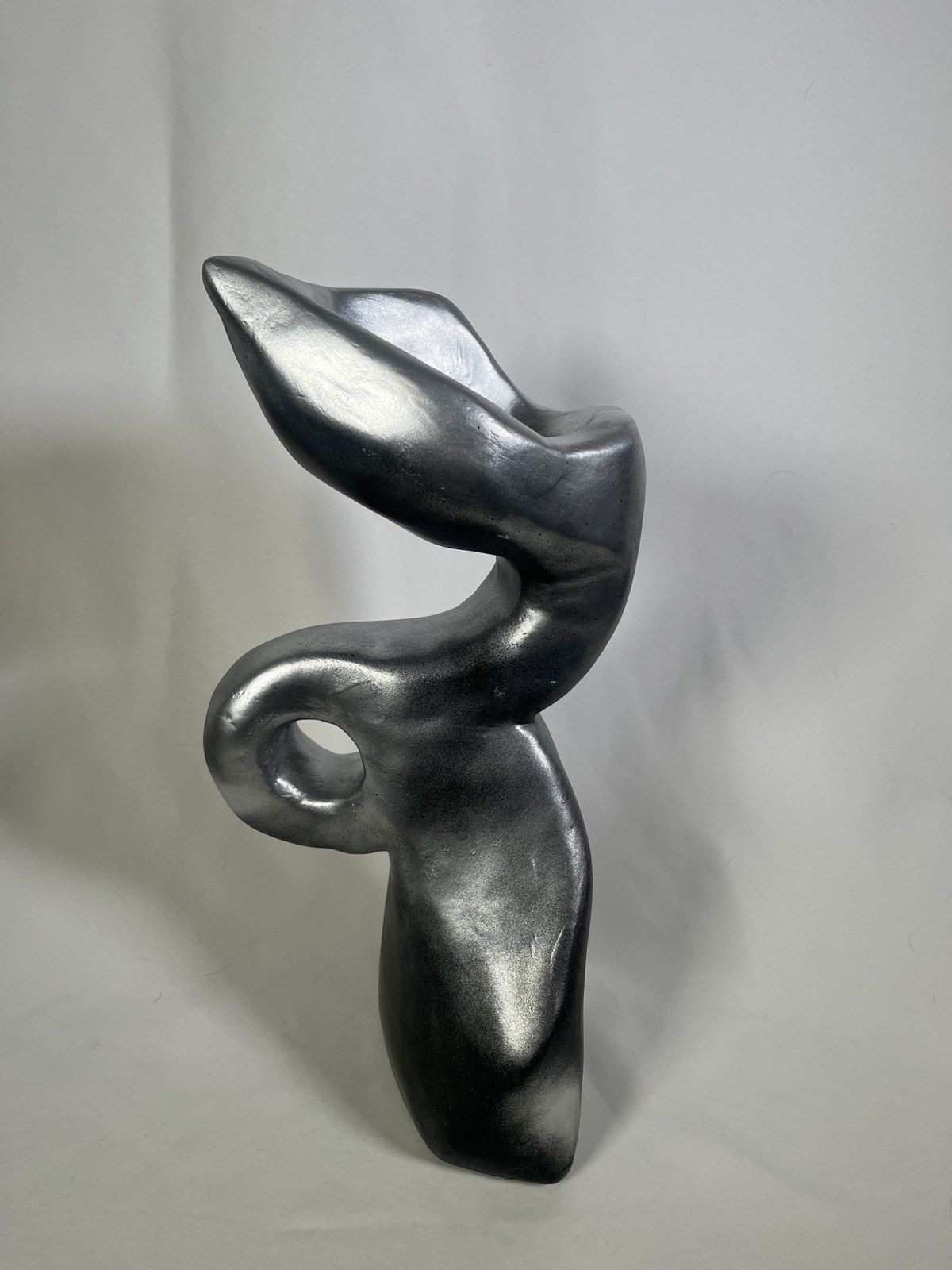 After the Smoke: a carved foam sculpture based on the way smoke folds into itself, by Kyle