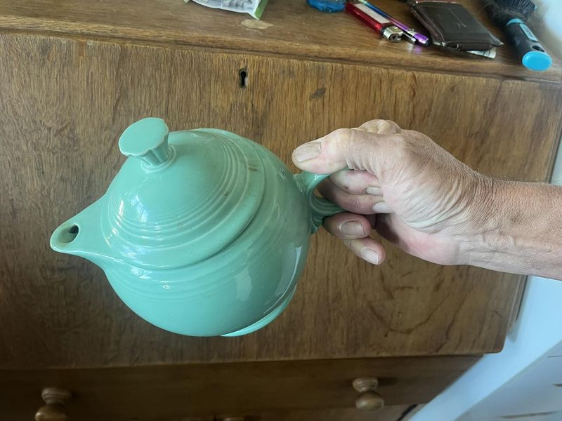 Reference photograph: his father’s hand holding the teapot
